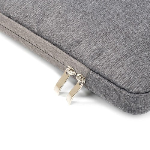 Grijze laptop sleeve 15-16 inch met een rits en een stijlvolle textuur voor bescherming en opbergen.